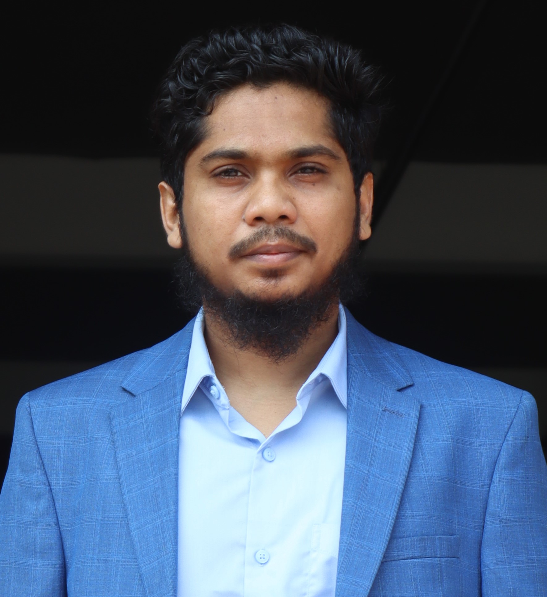 Tanveer Hasan